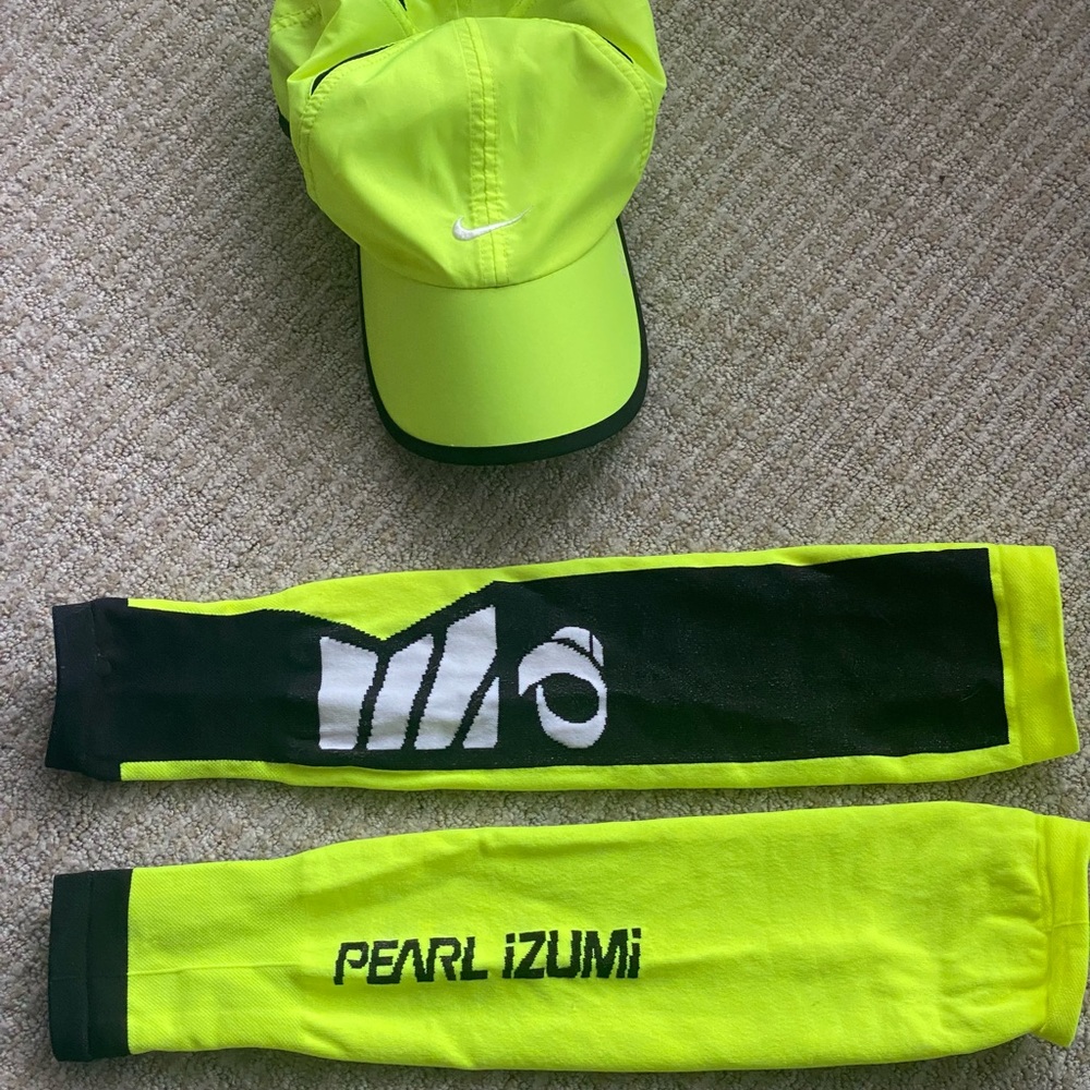 Pearl Izumi Neon Yellow Arm Warmers and Nike Cap